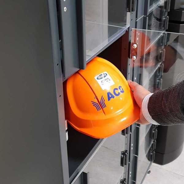 Collecting a safety helmet from Q-Lock smart vending machine.