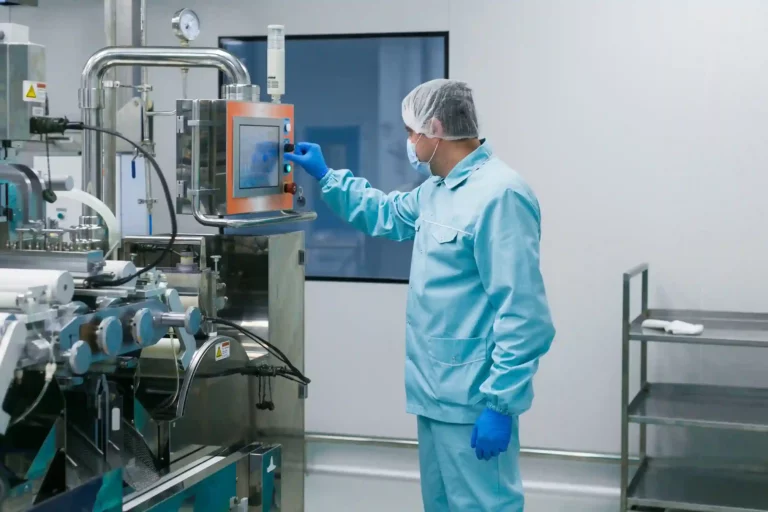 worker with blue protective clothing in chemical industry